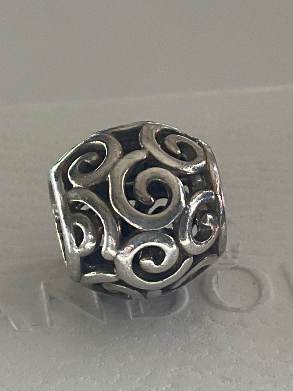 Pandora swirl charm